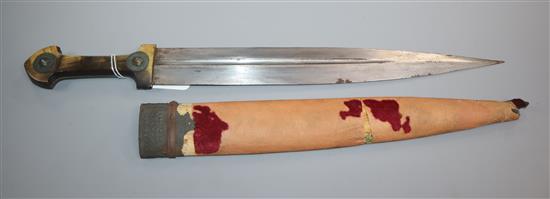 An Eastern dagger with leaf-shaped fullered blade, horn grip set metal bosses and wooden scabbard (a.f) L.50cm